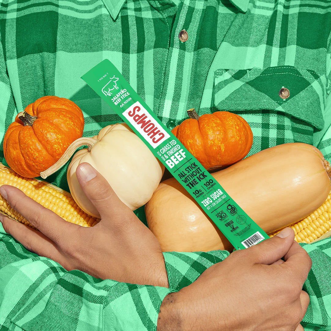 A person holding vegetables and a Jalapeno Beef Chomps